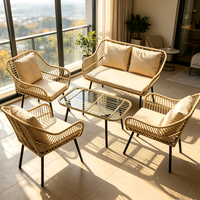 Ensemble de salon de jardin quatre pièces en rotin synthétique moderne avec structure en fer, couleur personnalisable, pour hôtel et cour.