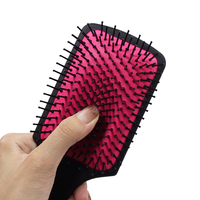 Peigne magique personnalisé de peinture élastique de pulvérisation d'ABS cheveux noirs brosse personnalisée de palette de coussin de couleur avec le logo pour des hommes femmes