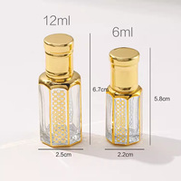 Bouteille d'huile de parfum essentielle en verre vide de luxe de Dubaï de 3ml 6ml 12ml avec Roll-on Golden Pattern UV Graver Arabian Attar Bottles