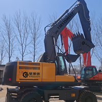Excavatrice sur pneus 4x4 robuste XINGGUOYI série DX DX150W-C avec moteur Cummins, forte puissance de creusement pour l'extraction minière et le brisage de roches