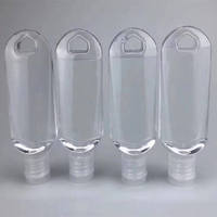 Bouteille souple portable en plastique de 30 ml et 50 ml avec mousqueton et bouchon à clapet pour savon liquide et désinfectant pour les mains, avec porte-clés