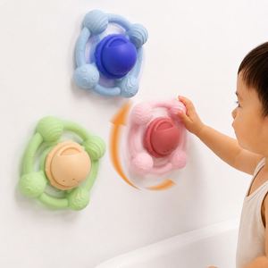 Jouets de bain en silicone en gros pour bébés, jouet rotatif à ventouse sensoriel pour tout-petits, OVNI, planète spatiale, pulvérisation d'eau, amusement dans la baignoire - Product Image 1