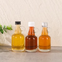 Mini bouteille de sirop en verre transparente de 40ml 50ml avec poignée en boucle pour le stockage de miel de sirop d'érable