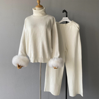 Ensemble deux pièces Jxwatcher : Manteau en laine tricoté à col roulé tendance et pantalon long taille haute pour femme avec poignets en vraie fourrure – Collection Automne