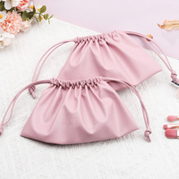 Sac à cordon en cuir PU avec logo personnalisé en relief, pochette cosmétique réutilisable en cuir PU pour emballage cadeau