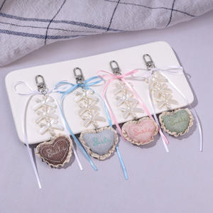 Ruban Cravate Porte-clés Pendentif Perle Bowknot Suspendu Dentelle Garniture Tissu En Forme De Coeur Plein De Charme De Fille - Product Image 1