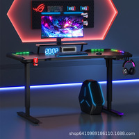Prix de gros Table de bureau de jeu réglable en hauteur lumière LED RVB de levage électrique Table d'ordinateur PC noire