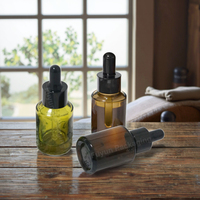 Flacon en verre ambré vert de luxe de 30 ml, fond épais, cylindrique, pour huile essentielle, sérum ou crème de soin de la peau, avec bouchon pompe ou bouchon à vis.