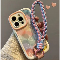 Coque de téléphone anti-chute pour iPhone 14, 15 Pro, 12 Pro, avec bracelet coloré motif cœur graffiti et visière intégrée, nouvelle collection