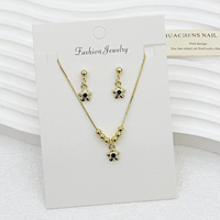 Ensemble de bijoux plaqué or 18 carats en cuivre avec pendentif dentaire et boucles d'oreilles, vente en gros