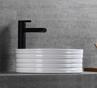 Offre Spéciale nouveauté ronde gaufrage dessus de table porcelaine gros salle de bain évier céramique Art bassin