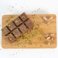 Chocolat de Dubaï Fournisseur direct d'usine Fabricant OEM Barre solide à motif avec confiture saveur noisette Barre de chocolat