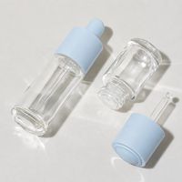 Botol Serum Kaca Bulat Bening 20ml 30ml dengan Dasar Tebal dan Pipet Tetes untuk Minyak Esensial dengan Logo Kustom