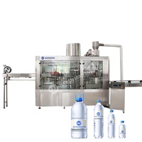 Projet d'usine d'eau pure économique Machine de remplissage d'eau à petite échelle entièrement automatique pour bouteilles