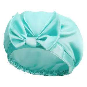 Grosir warna polos elastis Logo kustom topi tidur busur simpul malam sutra Satin rambut Bonnet untuk wanita