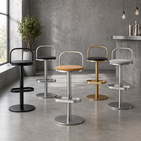 Tabouret de bar en acier argenté minimaliste de 65 cm à hauteur fixe avec siège rembourré noir pour café et restaurant
