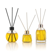 Flacon diffuseur de luxe en verre transparent rond de 150 ml avec bouchon argenté brillant pour ensemble de bâtonnets d'aromathérapie esthétique de spa