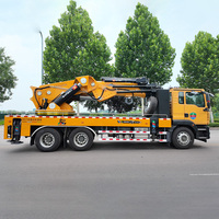 Grue de camion pliante JIUBANG, directement de l'usine, capacité de levage 18000 kg, moment de levage 7600 KN.M, pression nominale 30 MPa, portée des stabilisateurs 8200 mm