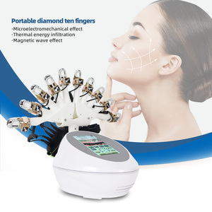 เครื่องนวดไฟฟ้าแบบสวมใส่ 10 <span class=keywords><strong>นิ้ว</strong></span> พร้อมระบบความร้อน 4 โหมด คลื่นกระตุ้นแบบฝังเข็ม สำหรับลดริ้วรอยและบรรเทา<span class=keywords><strong>อาการ</strong></span>ปวด - Product Image 1