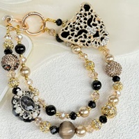 Cadena para teléfono móvil con forma de corazón, con perlas y estampado de leopardo, brillante y con diamantes, la más vendida, colgante artesanal para bolso