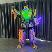 Costume Robot pour adulte Offre Spéciale, lumière Led, publicité, location d'entreprise, 2.7M de haut, jambes échasses, Costume de danse avec Microphone