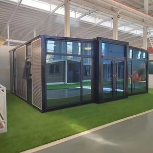 Magic House Maison portable 40 pieds Conteneur d'expédition modifié Maison conteneur avec terrasse et escalier - Product Image 2