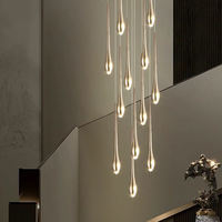 Grand lustre personnalisé en cristal au design minimaliste avec chaîne, idéal pour hôtels, maisons, escaliers et villas à plafonds hauts