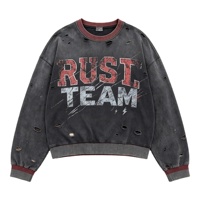 Sweat-shirt à col rond et manches longues Kornit DTG, texture égratignée, RUST TEAM, imprimé lettres audacieuses bicolores sur toute la surface, haut à plusieurs trous effilochés