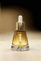 Bouteille de lotion en verre transparente mini carrée ou ronde à prix d'usine, flacon vide portable pour soins de la peau avec bouchon carré multicolore