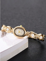 Montre Femme Lumière Marque De Luxe Perle Bijoux Cristal Bracelet Femme Mode Bracelet Quartz Horloge Montres