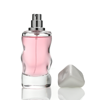 Flacon de parfum en verre le plus populaire, 50 ml, forme abstraite, flacon de parfum personnalisé, estampage à chaud en feuille d'or avec couvercle et boîte cadeau