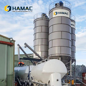 Silo à ciment en acier spiralé boulonné en acier inoxydable pour le stockage de grands volumes et un déchargement fluide vers les systèmes de convoyeurs à vis - Product Image 1