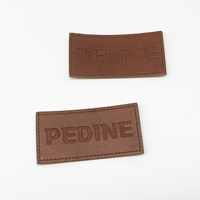 Écussons en cuir personnalisés du fabricant à bon prix Écussons en cuir gaufré avec logo pour sac à main Étiquettes en cuir pour chapeau/vêtement