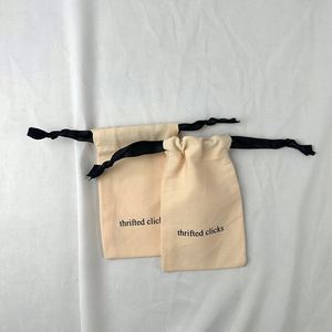 Wholesale <b>Small</b> Moq 100% Organic Cotton Packing Pouch Canvas Fabric Muslin Calico Pouch Eco Dust Pouch With <b>Black</b> Ribbon - Product Image 1