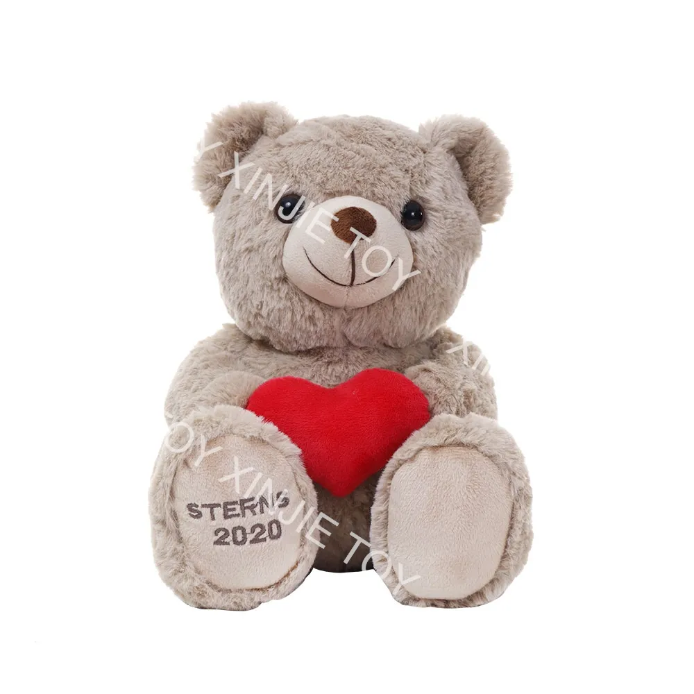 Oso de peluche sentado barato juguete de peluche personalizado con corazón juguete de peluche con logotipo de peluche oso de peluche