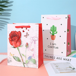 ถุงกระดาษช้อปปิ้งรีไซเคิลได้พร้อมที่จับริบบิ้นสำหรับบรรจุภัณฑ์ของขวัญเทียนคุณสมบัติการพิมพ์ดิจิตอลลามิเนต - Product Image 1