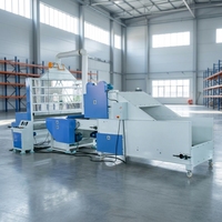 Machine à carder à fréquence variable pour fibres recyclées, pour la fabrication de tissus non tissés