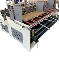 2023 petit profit mais vente rapide 1200 Machine automatique de colle de dossier de boîte de ligne ondulée à grande vitesse pour cartons