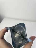 Sachet personnalisé thermoscellable à trois soudures latérales avec fermeture éclair et encoche de déchirement pour café, tisanes et feuilles de thé