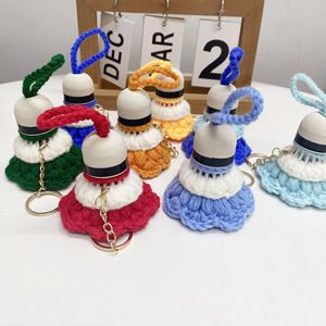 Llavero de muñeco de dibujos animados tejido a mano, colgante ecológico de lana de ganchillo, regalo hecho a mano para novio o novia - Product Image 1