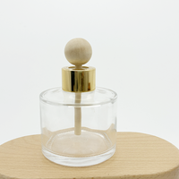 Bouteille diffuseur d'arômes en verre 50ml/100ml avec bouchon à vis, estampage à chaud, couleur personnalisée et bois