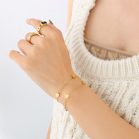 Bracelet à breloques en forme de coeur d'amour en or 18 carats bijoux de style classique en acier inoxydable à double couche de haute qualité