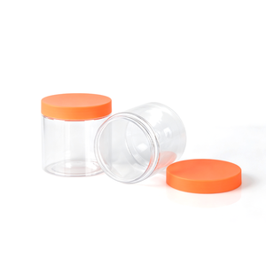 Pot en plastique PET transparent de qualité alimentaire de 450 ml pour l'emballage de bonbons, biscuits et aliments, avec logo personnalisé en relief doux orange. - Product Image 2