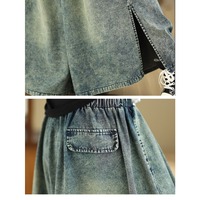 Nouvelle collection automne 2026 – Jean ample taille haute délavé bleu, coupe artistique minimaliste, jambe large fendue, longueur complète, décontracté et chic pour femme