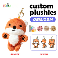 Porte-clés en peluche personnalisé OEM, mini chien en peluche avec costume de dinosaure vert, rembourré en coton doux, animal en peluche