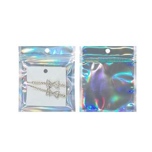 100 Uds. Bolsas impresas personalizadas con logotipo de regalo holográfico papel de aluminio con cierre de cremallera embalaje de plástico transparente bolsa de Mylar para <span class=keywords><strong>ropa</strong></span> cosmética - Product Image 6