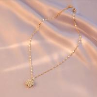 Collier tendance en acier inoxydable avec pendentif trèfle à quatre feuilles rotatif en pierre blanche, chaîne à maillons, pour femme, style brise froide, en cuivre de haute qualité