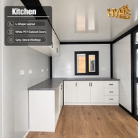 Maison conteneur extensible moderne de luxe 40 pieds, cadre noir, jaune désert, étanche et résistante au vent, idéale pour hôtel, bureau ou salon