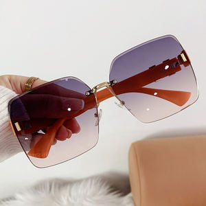 Lunettes de soleil à la mode rétro sans cadre à bord coupé résistant aux UV pour les femmes célèbres sur Internet pour la <span class=keywords><strong>photographie</strong></span> de rue - Product Image 4