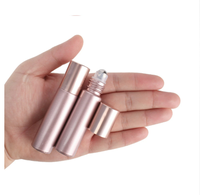 Nouvelles Bouteilles en Verre Roll-On Or Rose/Rose de 5ml et 10ml avec Bouchon à Vis et Sérigraphie – Récipients Vides pour Huiles Essentielles